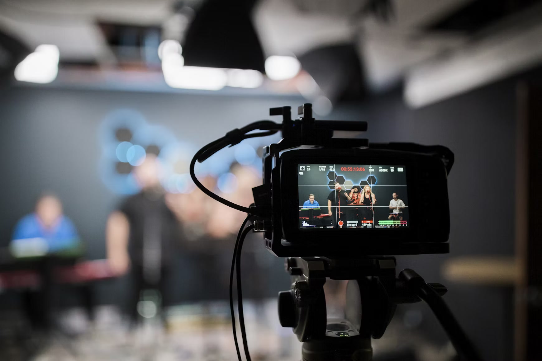 Cinema camera filming a band in a studio